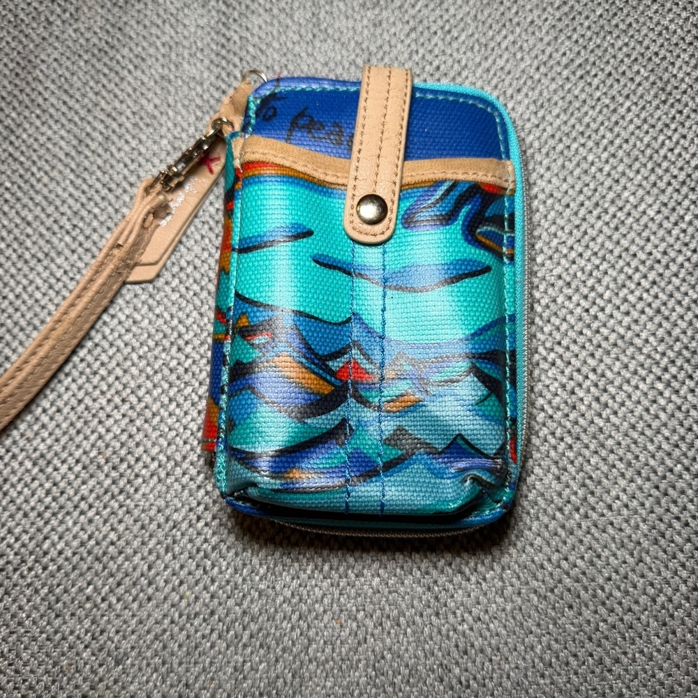 Sakroots wristlet/wallet in peace theme see wear in last pic-on strap also